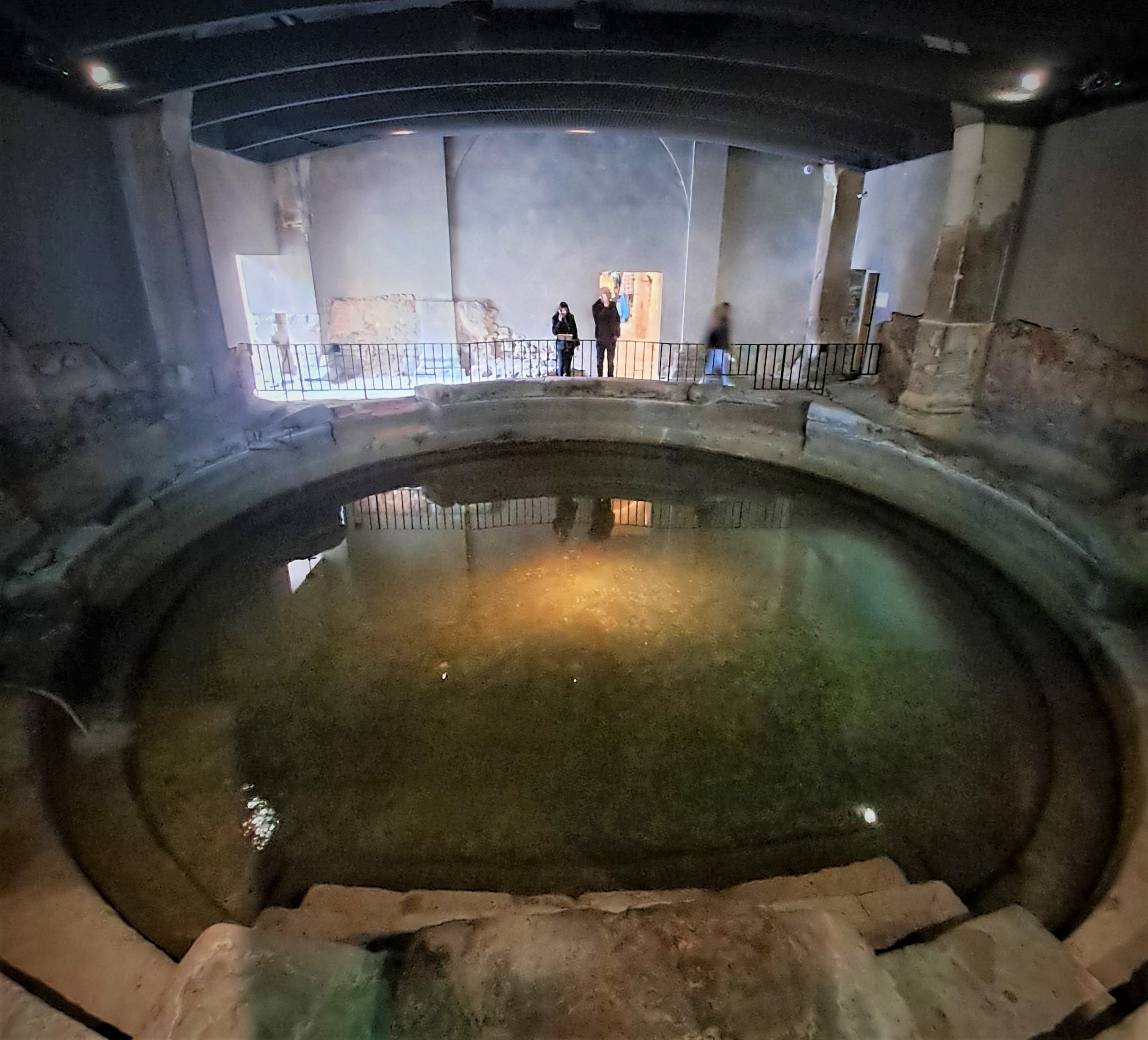 Making an offering to the goddess in the 21st Century Roman Baths